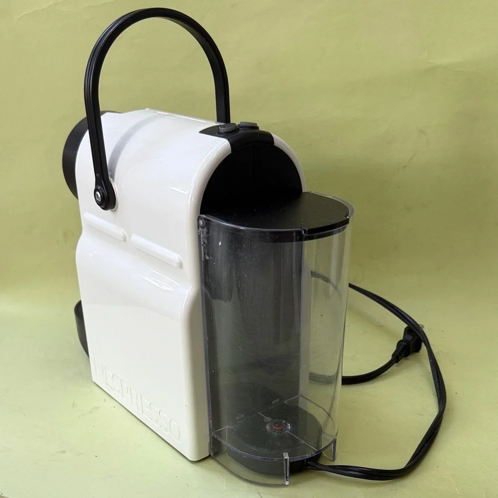 Nespresso White and Black Coffee Maker